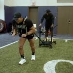 Michael Chandler Instagram - The people you surround yourself with are either the wind in your sails or the anchor holding you back. - In this case, @jholt_athelite and I are both of those things for eachother - join us at walkonfit.com @walkonfitness - Walk On. - See you at the top!