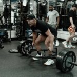 Michael Chandler Instagram - #workoutoftheday - Building some lower body power with special guest @cameronrhanes #keephammering - Walk On. - See you at the top!