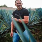Michael Chandler Instagram - My love for tequila runs deep. I’ve always enjoyed spending free time with friends and family while sipping on tequila. I am excited to announce I have invested and partnered with @hiatustequila. Their commitment to purity, quality, and excellence is unmatched. Walk on to our team - see you at the top! Looking for Hiatus? Check out the link in my bio. ⁠ #Hiatus #Tequila #OnHiatus #TequilaForTequilaPeople #UFC #MMA #Fighter #Cocktail #DiscoverYourSpirit