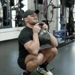 Michael Chandler Instagram - #workoutoftheday - after all these years of working out, I’m still finding new movements I am passionate about. These heel-elevated goblet squats are 🔥 and coupling them with a seated strict overhead press was a doozy. Getting the entire body involved on this superset. - Walk On. - See you at the top!
