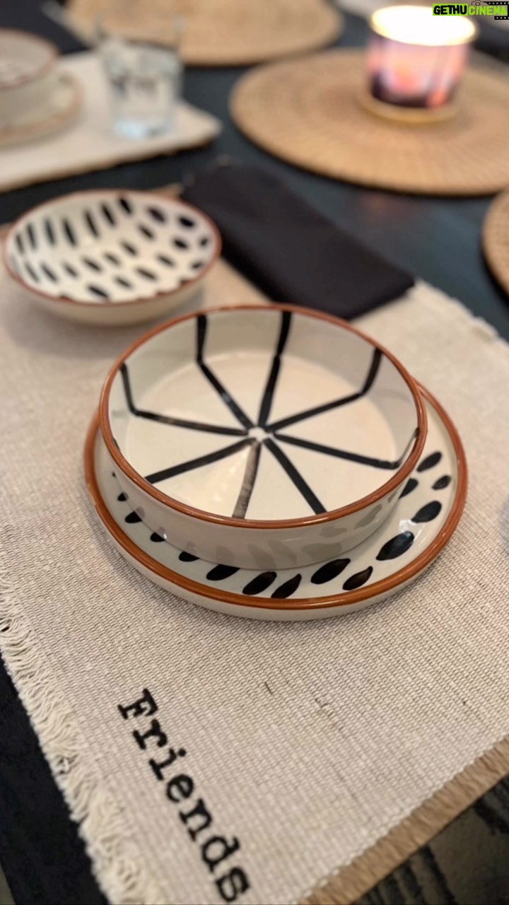 Mira Rajput Instagram - #DineWithMe Friends and family around the table with Food; That’s happiness for me. I love to entertain and enjoy collecting pieces for my table. Wherever I go, I am always on the look out for interesting crockery, table pieces and the most hard to find - Mats!! I’m not fond of table covers because I enjoy the whimsy of mixing and matching mats and charger plates. For an impromptu Asian meal this is what I put together: Crockery: @weavinghomes_india - I have been picking up things from them for a long time now. Even though the plates are smaller than a dinner plate, but the two kinds of bowls made it enjoyable to eat a meal in a bowl and have condiments on the side. Mats: @hm - I just loved the casual almost farmhouse vibe of these mats, and everyone enjoyed seeing what their mat said. The round wicker mats are a sensible pick, you can use them in so many different ways, but make sure you clean them with a dry brush after each meal. Napkins: Also from @hm. I actually picked up a bunch of solid colours that can go with most of my sets. Glasses: @ikea.india They just work. They don’t break, merge with most settings and honestly I didn’t give it much thought since I had 10 mins to set the table. Coasters: @fleckindia Candle: @ekamonline What you missed were the chopsticks I added last minute 😜 What do you think? . . . . . . . . . . . #instahome #homedecor #tablescape #tablesetting #reelsindia