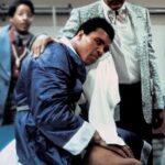 Muhammad Ali Instagram – Muhammad Ali icing down his broken jaw injury in his dressing room after his fight vs Ken Norton.⁣
⁣
📸: @neilleiferphotography⁣
⁣
 ⁣
#MuhammadAli #Icon #KenNorton #Injury #PostFight #1973 #BrokenJaw #NeilLeiferPhotography #BoxingResilience #ChampionSpirit