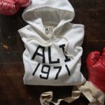 Muhammad Ali Instagram – The Birth Of Boxing’s Greatest Rivalry.⁣
Ali v Frazier | FOTC | New Arrival.⁣
⁣
“It was more than just a fight; it was an event, one that captured the imagination not just of the fight crowd, but of the entire world.” –Bert Sugar⁣
⁣
March 8, 1971. Muhammad Ali and Joe Frazier came together in the heart of Manhattan in a moment of truth. Given the dimensions of the day, both heavyweights represented much more than their own flesh and blood. The undefeated Ali, who at 25 years old had been stripped of his heavyweight title for refusing to register in the draft, was back at the doorstep of greatness after a three-year suspension. The undefeated Frazier, who was cast by many as a villain in the lead-up, the indestructible force that had pulled up residence in his absence. ⁣
⁣
This was champion versus champion, but also a crucible of the times. It was called the “Fight of the Century.” ⁣
 ⁣
@rootsoffight throws back to boxing’s most iconic event with this new ivory FOTC hoody!⁣
⁣
Ali x FOTC – By @rootsoffight | Link in story!⁣
⁣
⁣
#MuhammadAli #RootsofFight #KnowYourRoots