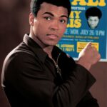 Muhammad Ali Instagram – A closeup portrait of Muhammad Ali during a photo shoot while training for his fight vs Jimmy Ellis at Astrohall. ⁣
⁣
Houston, TX.⁣
July 15, 1971.⁣
⁣
📸: @neilleiferphotography⁣
⁣
 ⁣
#MuhammadAli #Icon #Astrohall #TrainingDay #BoxingGreats #NeilLeifer #Photography