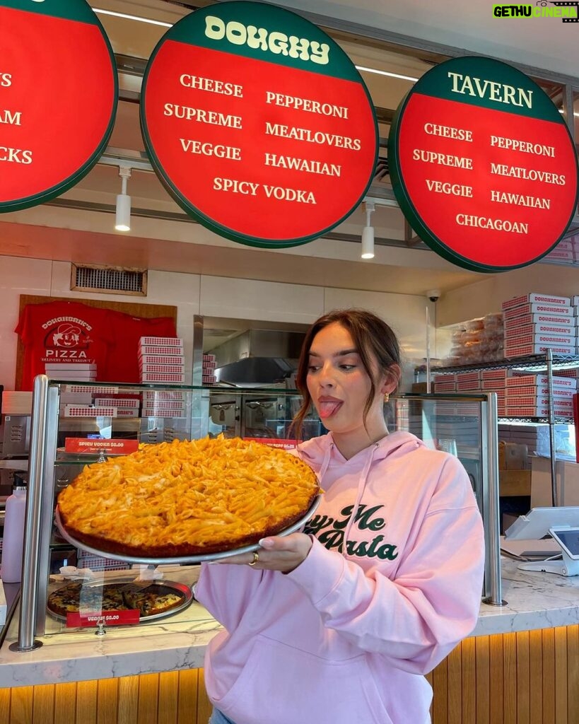 Natalie Mariduena Instagram - introducing THE NAT - our newest slice of the cheesiest, melt in your mouth vodka pasta piled high on your new favorite pizza pie. this one is no joke and only available @doughbriks for a limited time starting 10/17 (i can’t wait!!) 🤗🤤 Doughbriks Pizza