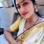 Navya Nair Instagram - “Wrapped in the elegance of a Kerala saree, basking in the glow of a beautiful darshan. Today, I feel truly divine. 🌼🌟 “ Saree @pichakamweaves #KeralaSareeMagic #DivineMoments #ambalamgirl #gratitude #godiseverything