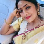 Navya Nair Instagram - “Wrapped in the elegance of a Kerala saree, basking in the glow of a beautiful darshan. Today, I feel truly divine. 🌼🌟 “ Saree @pichakamweaves #KeralaSareeMagic #DivineMoments #ambalamgirl #gratitude #godiseverything
