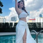 Nikita Rawal Instagram - Soft landing in 2024 ❤️💓 #nikitarawal #2024 #newyear #selflove #white #pool #waterbaby