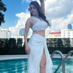 Nikita Rawal Instagram - Soft landing in 2024 ❤️💓 #nikitarawal #2024 #newyear #selflove #white #pool #waterbaby