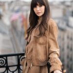 Nina Dobrev Instagram - Last week, @nina jetted to Paris for @miumiu’s fall/winter ‘24 show, an event that saw celebs like Emma Corrin, Lorde, Sydney Sweeney, and Joey King mingling in the front row. A #PFW regular, traveling overseas is always a treat for the former #VampireDiaries and #Degrassi star. “My favorite part is exploring Paris because, after all, the city is also a runway, and I love to use being here as an excuse to dress up a little more then usual,” she tells @_jonathanborge. “I love how young and fresh Miu Miu feels as a brand. It’s playful yet sophisticated with an edge.” At the link in bio, how she got ready for the show, and why hip-hop’s always on her getting-ready playlist. 📸: @tiziano.raw