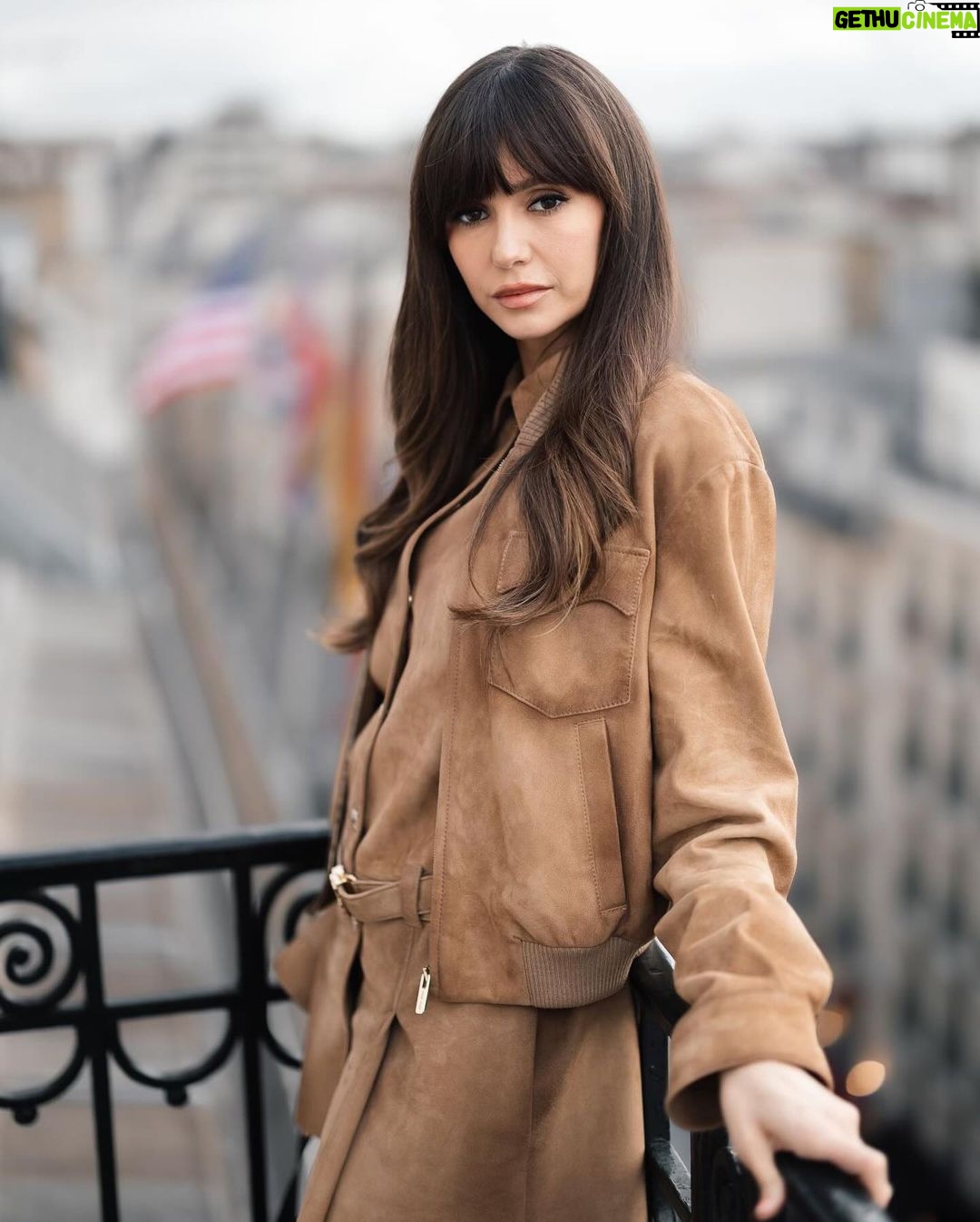 Nina Dobrev Instagram - Last week, @nina jetted to Paris for @miumiu’s fall/winter ‘24 show, an event that saw celebs like Emma Corrin, Lorde, Sydney Sweeney, and Joey King mingling in the front row. A #PFW regular, traveling overseas is always a treat for the former #VampireDiaries and #Degrassi star. “My favorite part is exploring Paris because, after all, the city is also a runway, and I love to use being here as an excuse to dress up a little more then usual,” she tells @_jonathanborge. “I love how young and fresh Miu Miu feels as a brand. It’s playful yet sophisticated with an edge.” At the link in bio, how she got ready for the show, and why hip-hop’s always on her getting-ready playlist. 📸: @tiziano.raw