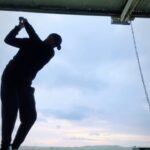 Paddy McGuinness Instagram - Warning!!! The following post contains Golf talk that may result in drowsiness. Did a spot of filming on the auld Emerald Isle 💚 and had an early finish! I’d not hit any balls in anger for a while so the good folk at @diamondcoast and @enniscronegolfclub lent me some bats for their driving range. The beauty of getting golf lessons, for me, is learning/knowing what you’re doing wrong and correcting it. The ball was going slightly right, I wasn’t lifting my heel up and pushing my hip through, soon as I realised the shots were consistently straighter. See the last shot. I used a 7 & 9 iron for an hour then sank a few pints of the auld black stuff! ⚫️⚪️ What a day! #ireland