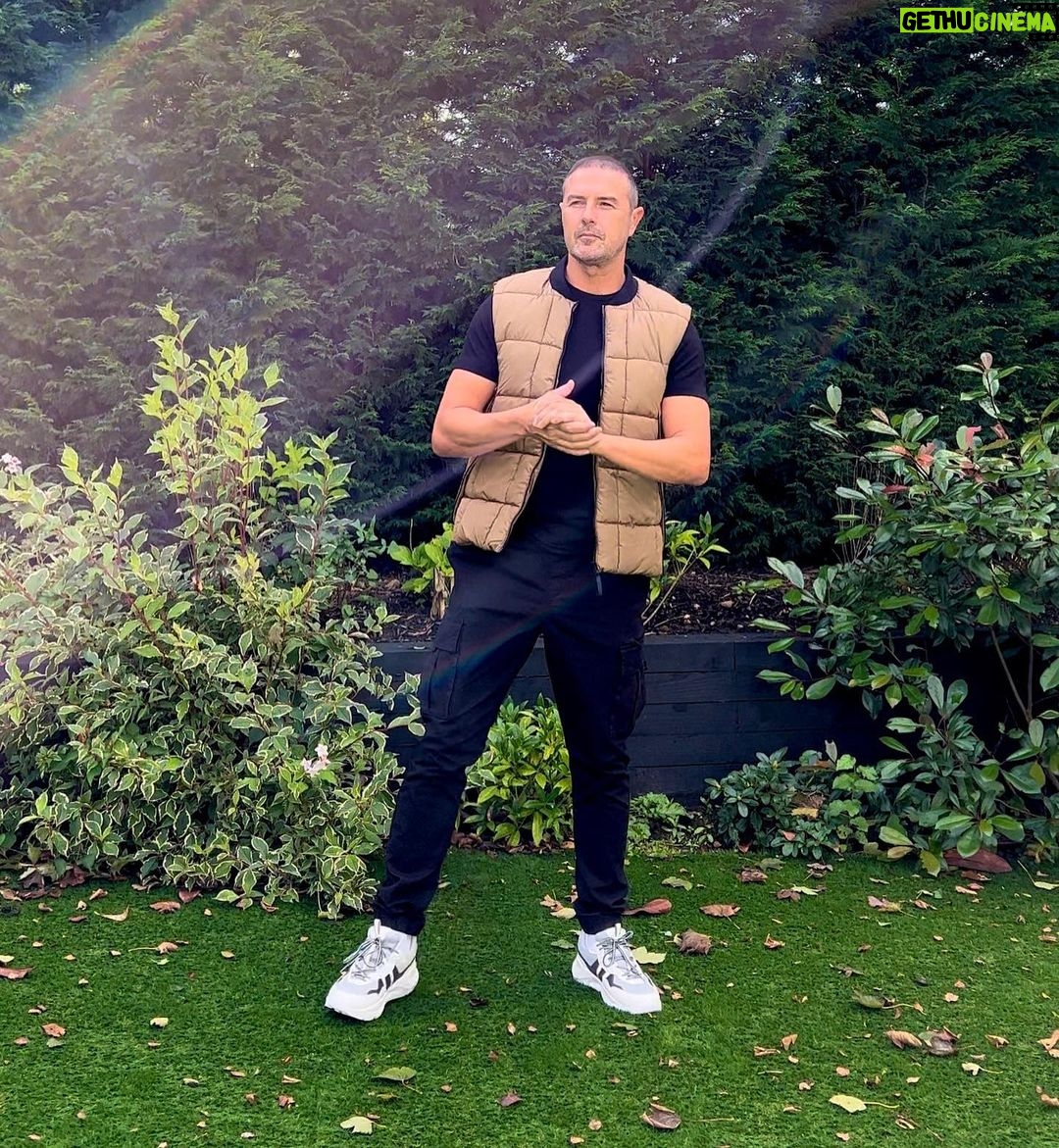 Paddy McGuinness Instagram - Gazing pensively into the middle distance, pushing biceps, the obligatory holding of sunglasses and my £20 quid body warmer. Now we’re modelling!!! @davidgandy_official #natural #vogue #modellife #elitemodel #bornwithit #boltonbeauty