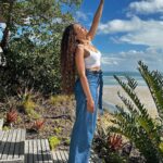 Pearl Thusi Instagram - How to have a break. Without a Kit Kat. uThandolwethu. Our love. Unbreakable. @thando__mokoena Jeans: @karllagerfeld @preview_designer_collection Sneakers : @karllagerfeld @preview_designer_collection