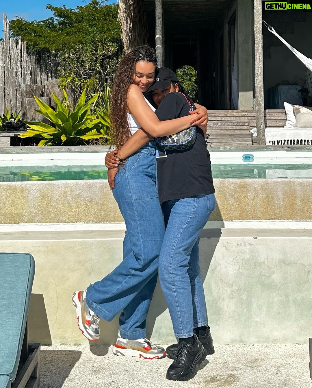 Pearl Thusi Instagram - How to have a break. Without a Kit Kat. uThandolwethu. Our love. Unbreakable. @thando__mokoena Jeans: @karllagerfeld @preview_designer_collection Sneakers : @karllagerfeld @preview_designer_collection