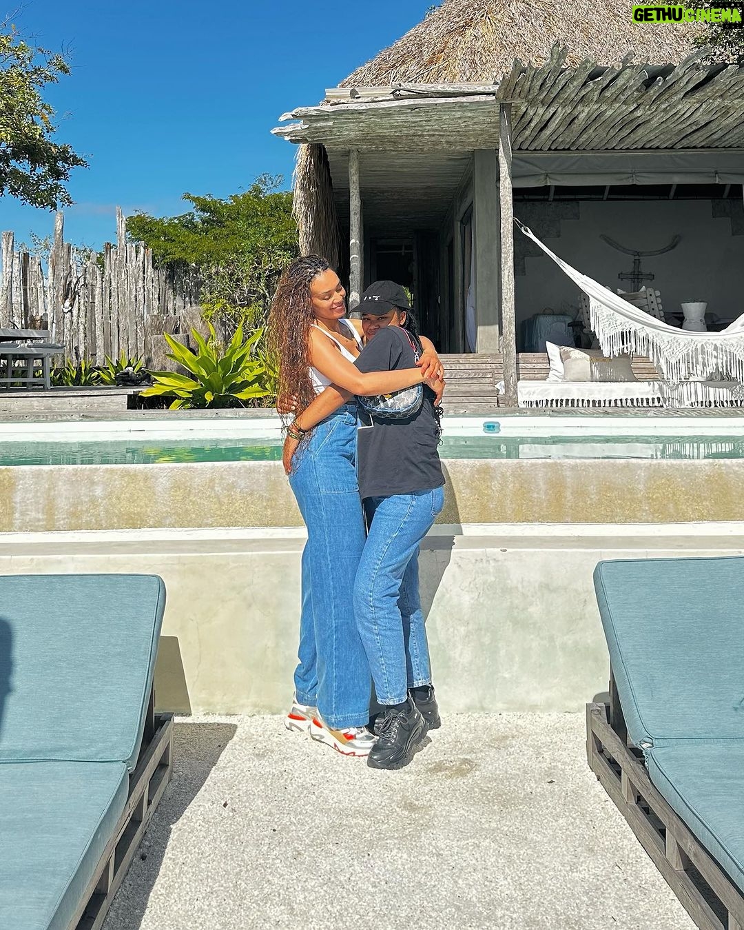 Pearl Thusi Instagram - How to have a break. Without a Kit Kat. uThandolwethu. Our love. Unbreakable. @thando__mokoena Jeans: @karllagerfeld @preview_designer_collection Sneakers : @karllagerfeld @preview_designer_collection