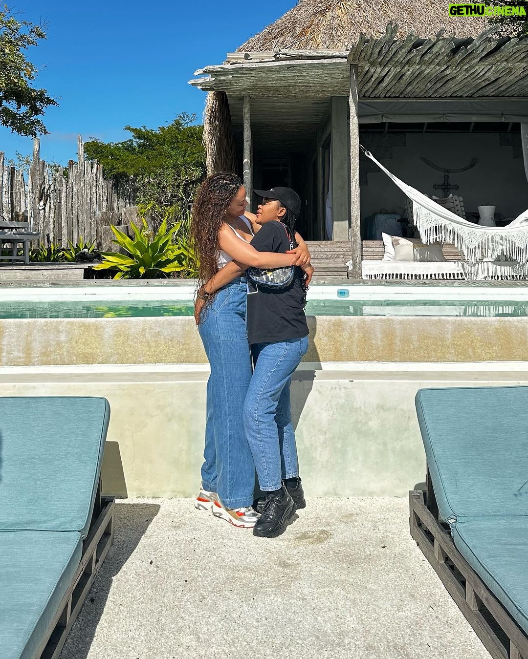 Pearl Thusi Instagram - How to have a break. Without a Kit Kat. uThandolwethu. Our love. Unbreakable. @thando__mokoena Jeans: @karllagerfeld @preview_designer_collection Sneakers : @karllagerfeld @preview_designer_collection