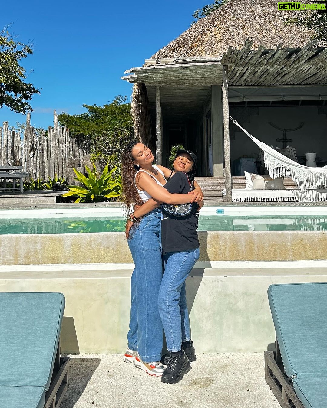 Pearl Thusi Instagram - How to have a break. Without a Kit Kat. uThandolwethu. Our love. Unbreakable. @thando__mokoena Jeans: @karllagerfeld @preview_designer_collection Sneakers : @karllagerfeld @preview_designer_collection