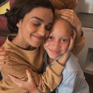 Rachel Zegler Instagram - a lil toast to my lil tribute babies (+ my baby cousin maude ivory), who made me a big sister (or just a regular sister… i know some of y’all are older it’s ok we’re ok calm down) and made me feel the happiest i ever have on a set before. the support amongst this cast is so real, and it’s been the best time ever to watch my fellow tributes on the big screen. and even better to share this moment with them. the number one movie in the world?!?!? these tributes are the reason. they’re so absolutely incredible and i love them all madly. DO ME A FAVOR: go out and see them in theaters this weekend. 🩷🐍🕊️

(i know some of you aren’t pictured but i am tagging you anyway because i love you so much.)

also that last photo is the reality of working on the set of the hunger games. mannequins EVERYWHERE.