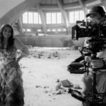 Rachel Zegler Instagram - day 1 of shooting the hunger games: the ballad of songbirds and snakes — this scene was entitled “the bloodbath”. here i am accompanied by dave thompson, our incredible a-camera operator. for every step i ran, dave was always running just as fast, just a few feet behind. 🩷🕊️🐍 in theaters friday 🐍🕊️🩷 📸: @murrayclose Wrocław