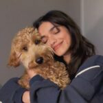 Rachel Zegler Instagram – happy 1st birthday to my sweet pup, lenny. you came to me in a time where i desperately needed love without conditions or apprehensions, and you’ve given me what i consider to be the best version of being alive. mommy and daddy love you so much. 💓♾️1️⃣
p.s.: you are officially old enough to know better now. put down the socks.