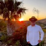 Rainn Wilson Instagram - Close your eyes. Picture me standing next to a desert shrub in a sunset in a white shirt with a hat and glasses. Now open them. Was it close to what you imagined?