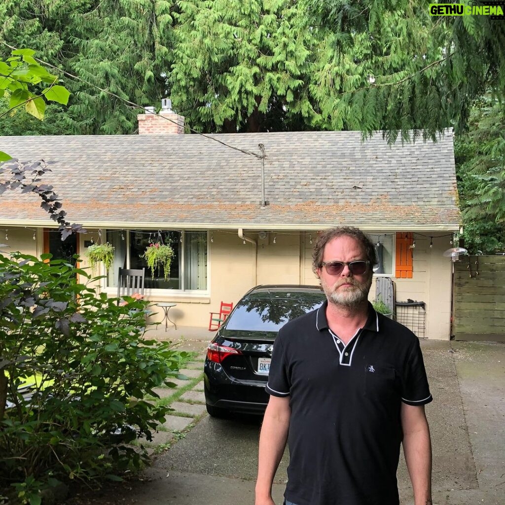 Rainn Wilson Instagram - This is the house I grew up in from 1974-1981 in Lake Forest Park Washington, north of Seattle. (I snuck into their driveway to take this photo.) 2 Bedrooms. About 1100 square feet. Too small to host our regular D&D games. Very mossy. I had to mow that lawn and wash my dad’s Ford pinto every weekend. I used to burn leaves with a magnifying glass on that front walkway. And we once trained a squirrel to run up our pantlegs and get a peanut from our pockets in the driveway. We were poor, but boy were we unhappy! #ChildhoodHome