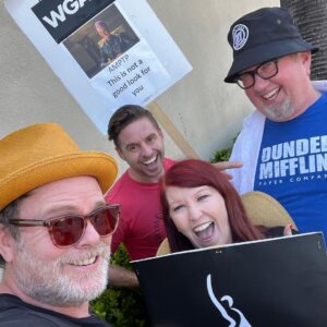 Rainn Wilson Instagram - Ran into old friends at the picket lines today at Warner Brothers!

Folks, this is about middle-class writers and actors trying to feed their families and pay their mortgages. This new streaming business model that has (impetuously and without any long-term consideration) transformed the entire industry over the last 5 years, has completely screwed over working class creatives in Hollywood in all kinds of ways - more draconian contracts, little to no residuals, and less writers room hires. For instance: remember the 57 BILLION MINUTES of The Office viewed on Netflix in 2020? Our “residuals” for that historic run were beyond pathetic. Netflix made out ok, however - a 27% jump and profits of 9B that year. Follow: @sagaftra for more info.