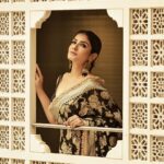 Raveena Tandon Instagram - Who better than Raveena Tandon (@officialraveenatandon) to celebrate the timeless allure of handwoven sarees! Someone who sparked the biggest of fashion trends and gave Bollywood some of the most iconic fashion moments, the actor harbours a special love for the six yards of silk. The beauty looks mesmerising in a black weave paired with a pair of statement earrings. The unconventional colour is a sure shot headturner in a sea of reds and maroons. Her subtle makeup: a feather light base, nude lipstick drenched in gloss and a touch of kohl on the eyes complements the look. Follow Showstoppers for more inspiration to make a style statement this wedding season. Concept & styling: @sharaashraf Photos: @amitkhannaphotography Production: @shweta__sunny & @kayanaaaaat Makeup and hair: @kin_vanity Location: @itcmaratha Outfit: Saree by @meerabypoornimasharma Jewellery: @sahai_ambar_pariddi #raveenatandon #raveenatandonfans #weddingspecial #weddingseason #weddingstyle #weddingoutfit #weddingoutfits #saree #sareelover #sareelove #varanasi @raveenatandonfanpage @raveenatandonbiggestfan @raveenatandon_trueadmirer @raveenatandonfan_