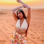 Ruma Sharma Instagram - The temperature is high here but so is my mood ✨ #dubaidesert . . #rumasharma #dubaidesertsafari #desertphotography #sunandsand #goldenhourlight #sundowner #dubaitravel #dubaitravelblogger #travelwithlove Dubai Desert