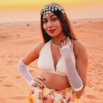 Ruma Sharma Instagram - The temperature is high here but so is my mood ✨ #dubaidesert . . #rumasharma #dubaidesertsafari #desertphotography #sunandsand #goldenhourlight #sundowner #dubaitravel #dubaitravelblogger #travelwithlove Dubai Desert
