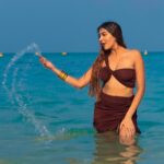 Ruma Sharma Instagram - Bringing a little shore into your feed 🤍 . . Shot by - @qamarraza04 Edit by - @wasey_rock69 . #dubaibeach #rumasharma #dubaibeachlife #beachphotoshoot #dubaibeaches #sunandsand #dubailifestyle #loveforbeaches Dubai UAE