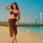Ruma Sharma Instagram - Bringing a little shore into your feed 🤍 . . Shot by - @qamarraza04 Edit by - @wasey_rock69 . #dubaibeach #rumasharma #dubaibeachlife #beachphotoshoot #dubaibeaches #sunandsand #dubailifestyle #loveforbeaches Dubai UAE