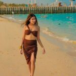 Ruma Sharma Instagram - Bringing a little shore into your feed 🤍 . . Shot by - @qamarraza04 Edit by - @wasey_rock69 . #dubaibeach #rumasharma #dubaibeachlife #beachphotoshoot #dubaibeaches #sunandsand #dubailifestyle #loveforbeaches Dubai UAE