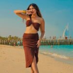 Ruma Sharma Instagram - Bringing a little shore into your feed 🤍 . . Shot by - @qamarraza04 Edit by - @wasey_rock69 . #dubaibeach #rumasharma #dubaibeachlife #beachphotoshoot #dubaibeaches #sunandsand #dubailifestyle #loveforbeaches Dubai UAE