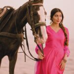 Ruma Sharma Instagram - Queen of my own world 🤍 . Wearing - @myshka_fashion Styled by - @yourstylistforever PC - @abhinesh_photographer Edit by - @wasey_rock69 . #rumasharma #lookelegant #myshka #anarkalidresses #horsephotoshoot #suitstyles #indianwearlove #pinksuit #outfitofthedaybabe #desifashionista Mumbai, Maharashtra