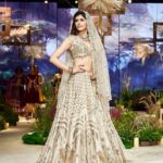 Sanjana Sanghi Instagram - • Magic ✨• And then, it was a double century turning Showstopper for the iconic couturier & my dearest, @anjumodi at @lakmefashionwk Closing “GLITERATTI” adorning this surreal piece of art, was a moment laden with such pride for me. This one is going to be etched in my heart for a long time. #LakmeSalonxAnjuModi @fdciofficial