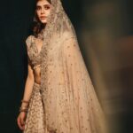 Sanjana Sanghi Instagram - • Magic ✨• And then, it was a double century turning Showstopper for the iconic couturier & my dearest, @anjumodi at @lakmefashionwk Closing “GLITERATTI” adorning this surreal piece of art, was a moment laden with such pride for me. This one is going to be etched in my heart for a long time. #LakmeSalonxAnjuModi @fdciofficial