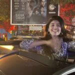Sanjana Sanghi Instagram - Circa 2018. When I first moved to Mumbai to pursue acting full time after graduating from LSR College in New Delhi, this specific billboard in Juhu was one I’d cross everyday with the Mumbai breeze rustling against the auto-rikshaw. I’d always be looking up at it, with a glee of hope and dreams in my heart that I was mostly too scared to even acknowledge to myself. As I drove past that very billboard last night, seeing Kadak Singh up there made my heart shine & smile. Smile with joy as an ode to the power of believing. To dreaming. To learning. To be hard working. To be non- fearing. 2024, I’m so excited about you being a wholesome melting pot of all these beautiful feelings and more. ✨🧡 #HeadDownEyesForward ☀️ Juhu, Mumbai