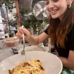 Sanjana Sanghi Instagram - When in Rome…. Focus on your carbonara & vintage shops 🤓 . 👜: JW pei @nykaafashion Rome, Italy