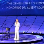 Sarah Rafferty Instagram - After years of being graciously included in my friends’ Jewish holiday celebrations and hearing them say, “L’ shana haba’ah B’Yerushalayim”, last week I traveled to Jerusalem for the first time to host The Genesis Prize ceremony. Deemed the “Jewish Nobel”, Genesis is a $1 million annual prize awarded to Jewish individuals in recognition of their personal and professional contributions to humanity. In the sprit of “Tikkun Olam”, all Genesis laureates donate their prize money to worthy causes, in an effort to “repair the world”. The evening opened with a powerful tribute to the doctors and NGO’s who are working with refugees of the war in Ukraine; and culminated in awarding Dr Albert Bourla, for his visionary leadership during the Covid pandemic. Albert is the Chairman and CEO of Pfizer and the son of Holocaust survivors. He plans to use his prize to create a Holocaust museum in his hometown of Thessaloniki, Greece. Albert’s parents were among the 2,000 survivors of a once thriving Jewish community of over 50,000. I am incredibly grateful for the opportunity to make a personal call to action to the doctors and scientists in attendance and to the scientific community at large. As Dr. Bourla has said, we are on the verge of a scientific renaissance, and it is my profound hope that in the coming years, a cure for Alzheimer’s and Dementia will be found. With my daughters and husband in attendance, and with the support of my mother and sisters, I spoke publicly for the first time about my father’s struggles with Alzheimer’s. It was a privilege to thank Albert and his team for creating a vaccine that helped the world and personally helped to safely reunite my children with my parents before my father lost the ability to recognize them. This trip to the Holy Land began my personal journey toward better understanding thousands of years of rich history and devastatingly complex conflict…. (Caption continued in comments) Photo: @noamc_official 👗 @galialahav
