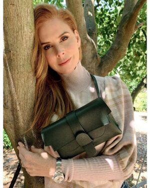 Sarah Rafferty Instagram - Hi friends, this April, in honor of earth month, I am excited to partner with my favorite handbag company @Senreve. Please tune in tomorrow at 10 am Pacific time for an IG Live with my friend and Senreve founder, Coral Chung.  We are going to talk about her journey launching a luxury brand, female entrepreneurship, and Senreve’s efforts in sustainability, including the launch of their Handbag Revival event. Please leave any questions you’d like me to ask @coralllista below. I hope you  can join us. 😘 📷cred @dklahair #ad
