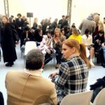Sarah Rafferty Instagram - One year ago...the last time I packed into a crowded room and @nicholasme packed me into a suit. Looking forward to safely and nonchalantly gathering soon. There’s light at the end of this tunnel, right? @alexandrevauthier. Btw Bernie walked this show in his mittens.