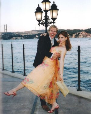 Sarah Rafferty Instagram - #fbf #Istanbul 2004. Happy 22, (one day late) Santtu. I love nothing more than seeing the world with you….and seeing our child troll us on instagram. How did she access photos from the 90’s? 😂🤓🎾🌎🥂
👗via my grandmother’s trunk.