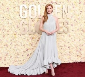 Sarah Rafferty Instagram - Thank you @goldenglobes for inviting me to join old friends and new yesterday. It was a thrill and an honor. 

So much thanks is due to so many for helping  this lady step out with just few days notice. I can never thank my tireless and intrepid manager, Charlton Blackburne, enough for all he does for me….including flying to Paris to deliver this @Lanvin creation. 

Thank you to our friends @sylvainruffier @camera_lucida_  and the #lanvin team for helping us while still on holiday. 
Thank you @louboutinworld for fairytale shoes. 
Thank you @beau_nelson and @davestanwell for the face and the hair and the borderline excessively needy hand holding. 
Thank you bff @annarothmilner for the world’s most artful and utterly essential taping of the bits on a windy day, 💃
@ohmeredith for the remote hair coloring., 😂
@brazilianbeautybarla for the witchery.
@tylerellisofficial 👛
@leonyvonne 💍@joyeriayanes