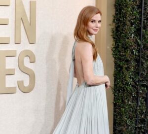 Sarah Rafferty Instagram - Thank you @goldenglobes for inviting me to join old friends and new yesterday. It was a thrill and an honor. 

So much thanks is due to so many for helping  this lady step out with just few days notice. I can never thank my tireless and intrepid manager, Charlton Blackburne, enough for all he does for me….including flying to Paris to deliver this @Lanvin creation. 

Thank you to our friends @sylvainruffier @camera_lucida_  and the #lanvin team for helping us while still on holiday. 
Thank you @louboutinworld for fairytale shoes. 
Thank you @beau_nelson and @davestanwell for the face and the hair and the borderline excessively needy hand holding. 
Thank you bff @annarothmilner for the world’s most artful and utterly essential taping of the bits on a windy day, 💃
@ohmeredith for the remote hair coloring., 😂
@brazilianbeautybarla for the witchery.
@tylerellisofficial 👛
@leonyvonne 💍@joyeriayanes