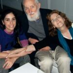 Sarah Silverman Instagram - My beloved step-dad, John O’Hara, died 16 years ago today. He was a quiet, kind, beautiful man. His love language was building things - he built the bed I slept on and the porch we spent our summers on. He kept the wood stove going in the winter, and even tolerated my loud obnoxious (adorable) Dad - pictured with him shirtless) He always gave me the classic step-dad side hug and he’d joke “I don’t care what they say — I like you!” but I knew the truth- he loved me. And I hold onto that now more than ever.