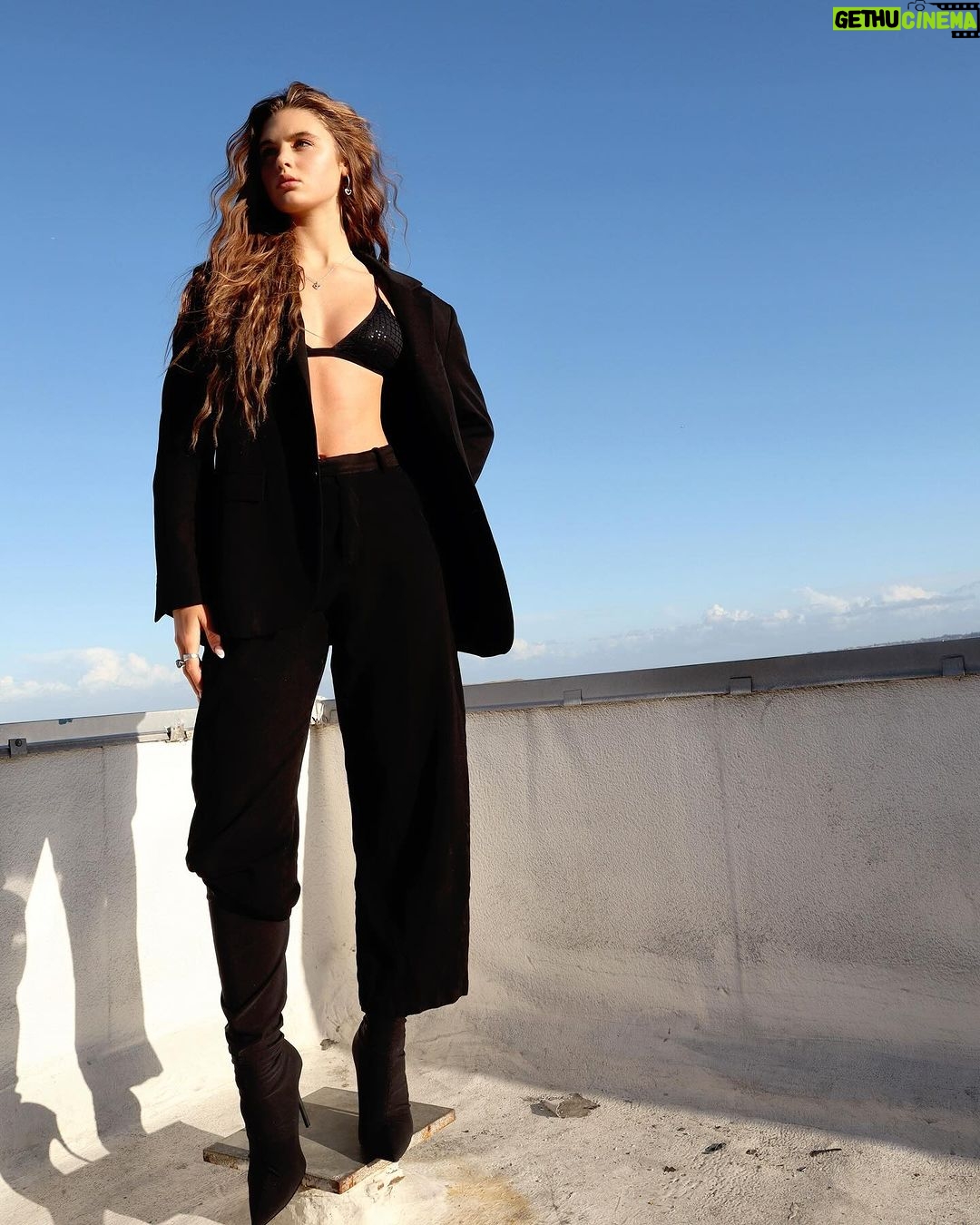 Savannah Clarke Instagram - M E R C Y __________________________________ I don’t know what this is ‘Cause you got me good Just like you knew you would ___________________________________ #PerformanceDay #Mercy #Duffy #NewSongCover #RoofTopPhotos #BlackSuits #SunsetBoulevard #GoldenHour #MermaidWaves #Siren #SavannahsSirens #CollectiveTrend #WomenInSuits #SuitsStyle #ootdSubmit __________________________________ __________________________________ 9000 Sunset Building