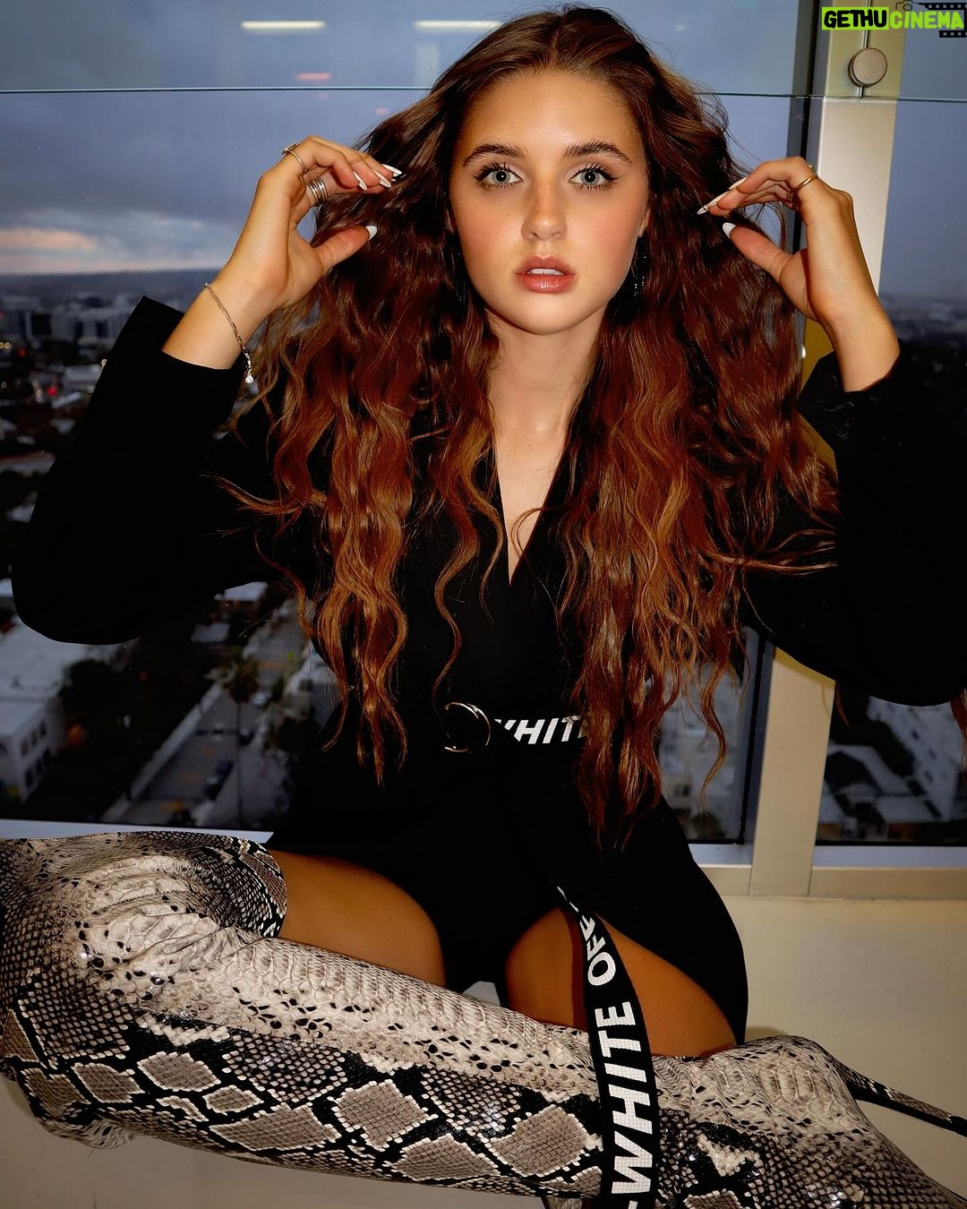 Savannah Clarke Instagram - C A R P D I E M _________________________________ Seize the day : To put aside all differences , all fears , all worries , and just go for it. _______________________________________ #CarpDiem #SiezeTheDay #QuotesToLiveBy #OversizedJackets #SnakePrint #ThighHighBoots #SignatureLook #DayAtWork #PerformanceDay #CrimpedHair #Belt #BootsLover #EveningsWithAView #JustGoForIt _____________________________________ West Hollywood CA