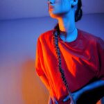 Savannah Clarke Instagram – I N T O 
T H E 
B L U E 
___________________________________

To shine your brightest light
Is to be who you truely are. 

____________________________________
#IntoTheBlue #BlueLight #Portrait_Visions #TakenByMe #PlayingWithLight #Contrast #UltraVioletLight #Orange #TshirtDress #LongBoots #KeepShining #ShineBright
___________________________________
_____________________________________ Sydney